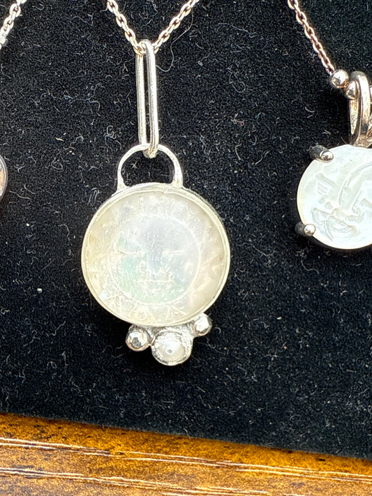 Celestial Mother of Pearl Sun Face Pendant