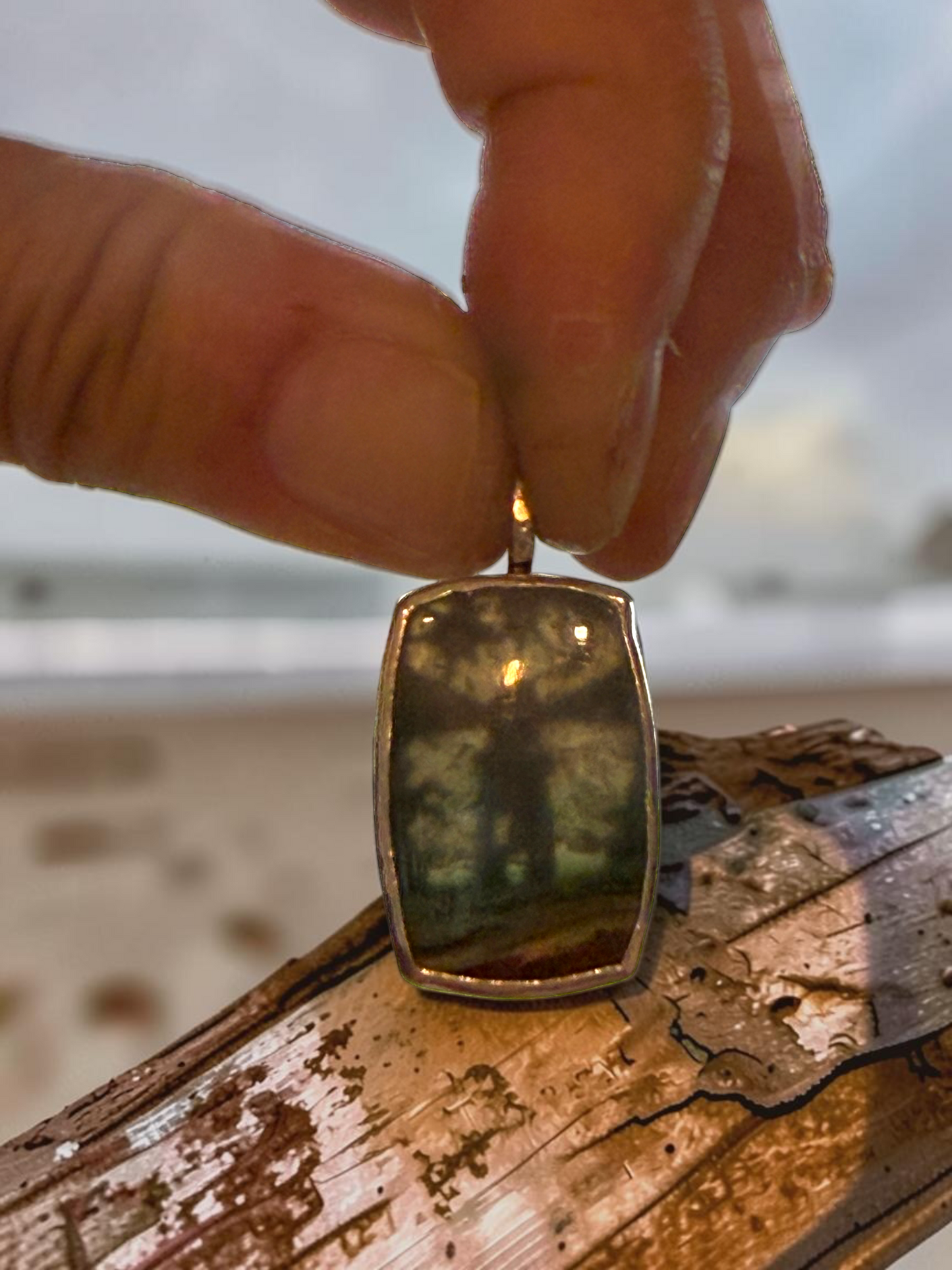 Opalized Wood Lighthouse Pendant With Stars