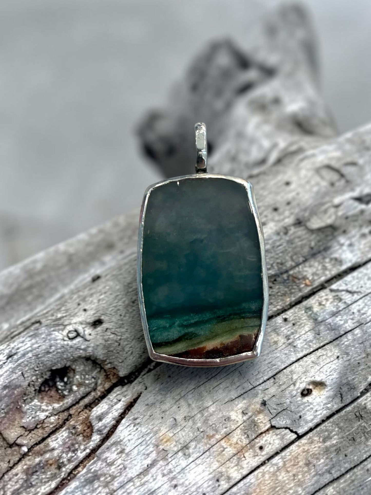 Opalized Wood Lighthouse Pendant With Stars