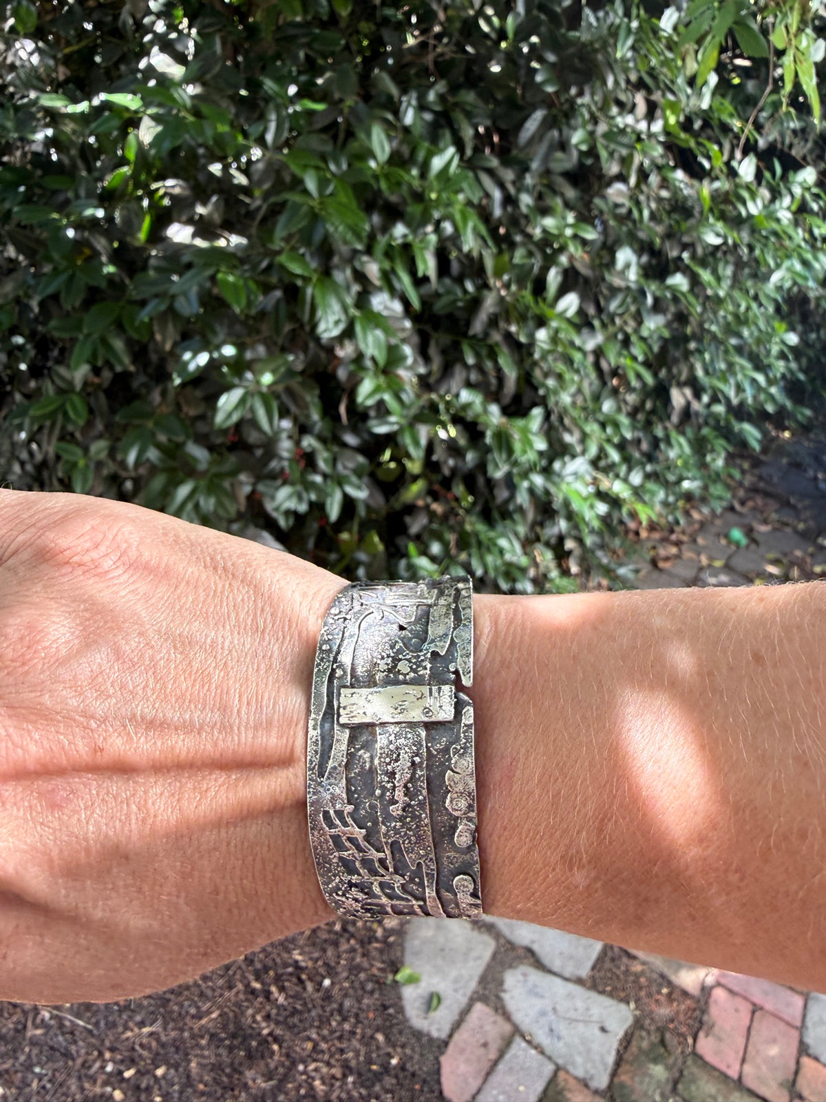 Cape Henlopen Watchtowers cuff worn on the wrist