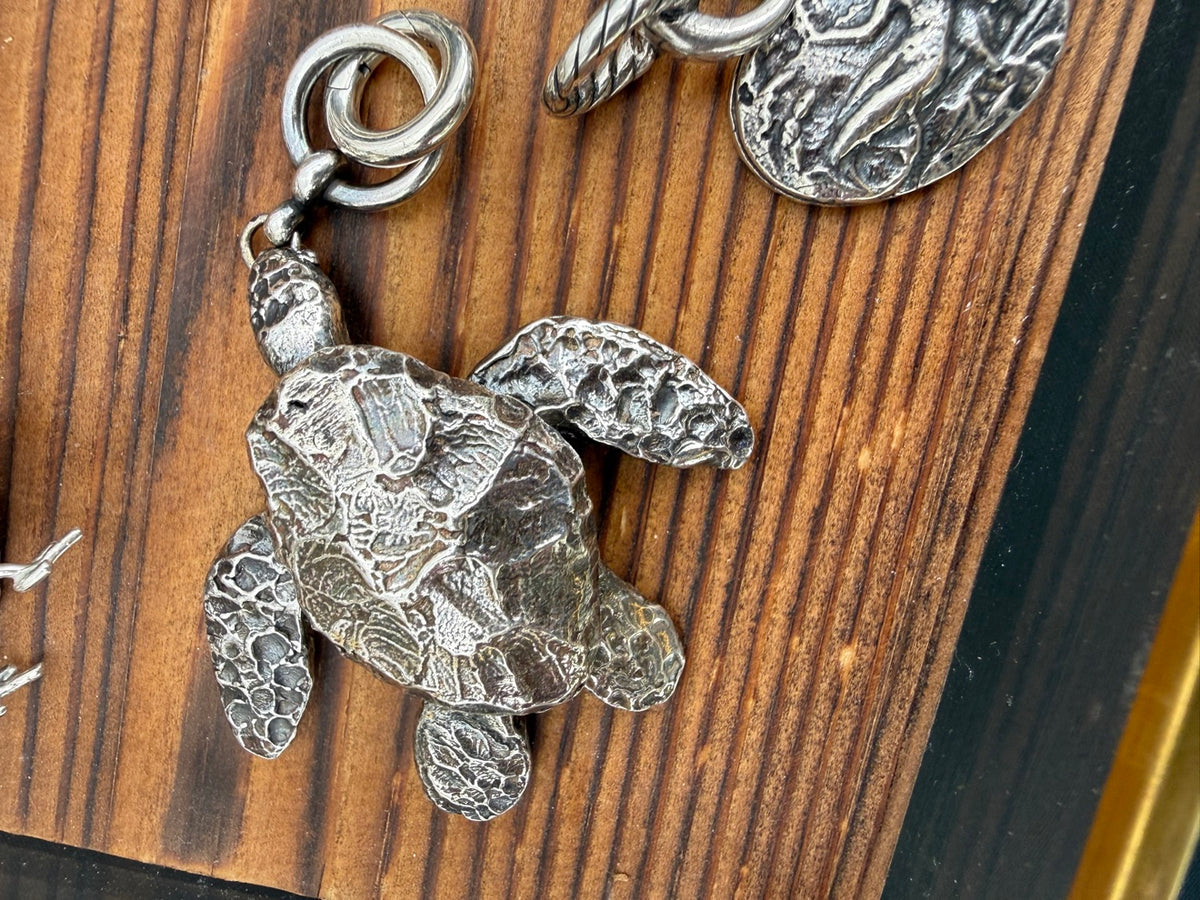 Articulated large lost-wax cast turtle charm, top view