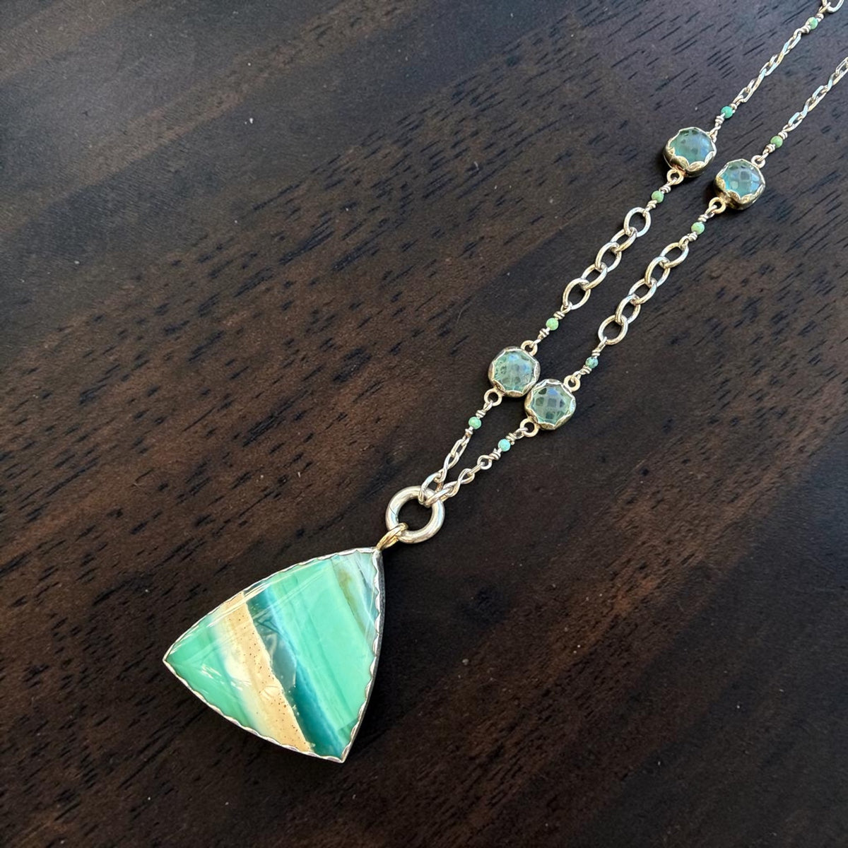 Opalized fossil wood pendant on its custom chain with bezel-set fluorite and turquoise beads