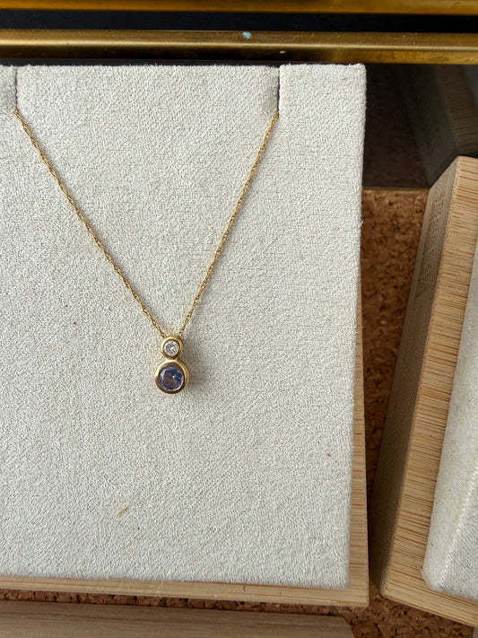 Tanzanite and diamond pendant in 14k gold on a 16-inch chain